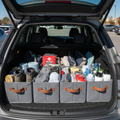 Neat trunk bins with travel essentials, daylight parking lot